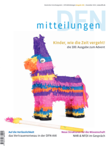 Titelbild der 100ten Ausgabe der DFN Mitteilungen. Abgebildet ist eine Piñata.
