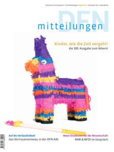 Cover of the 100th 'DFN Mitteilungen'. Shown is a Piñata.